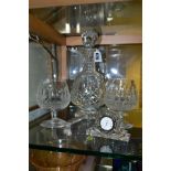 WATERFORD CRYSTAL, comprising a Lismore brandy decanter, two brandy glasses, a quartz clock and