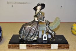 AN ART DECO SPELTER MARBLE AND CHRYSELEPHANTINE EFFECT FIGURE GROUP OF A LADY HOLDING A BOUQUET OF