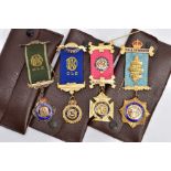 FOUR SILVER MASONIC FOB MEDALS, to include three silver gilt medals, each engraved and fitted with