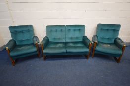 A MID CENTURY TEAK TURQUOISE THREE PIECE LOUNGE SUITE comprising a two seater and a pair of