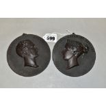 A PAIR OF VICTORIAN BOIS DURCI PORTRAIT RELIEF RONDELS, depicting 'Victoria Queen of England' and '