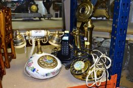 THREE TELEPHONES, comprising a modern reproduction candlestick telephone with rotary dial, an