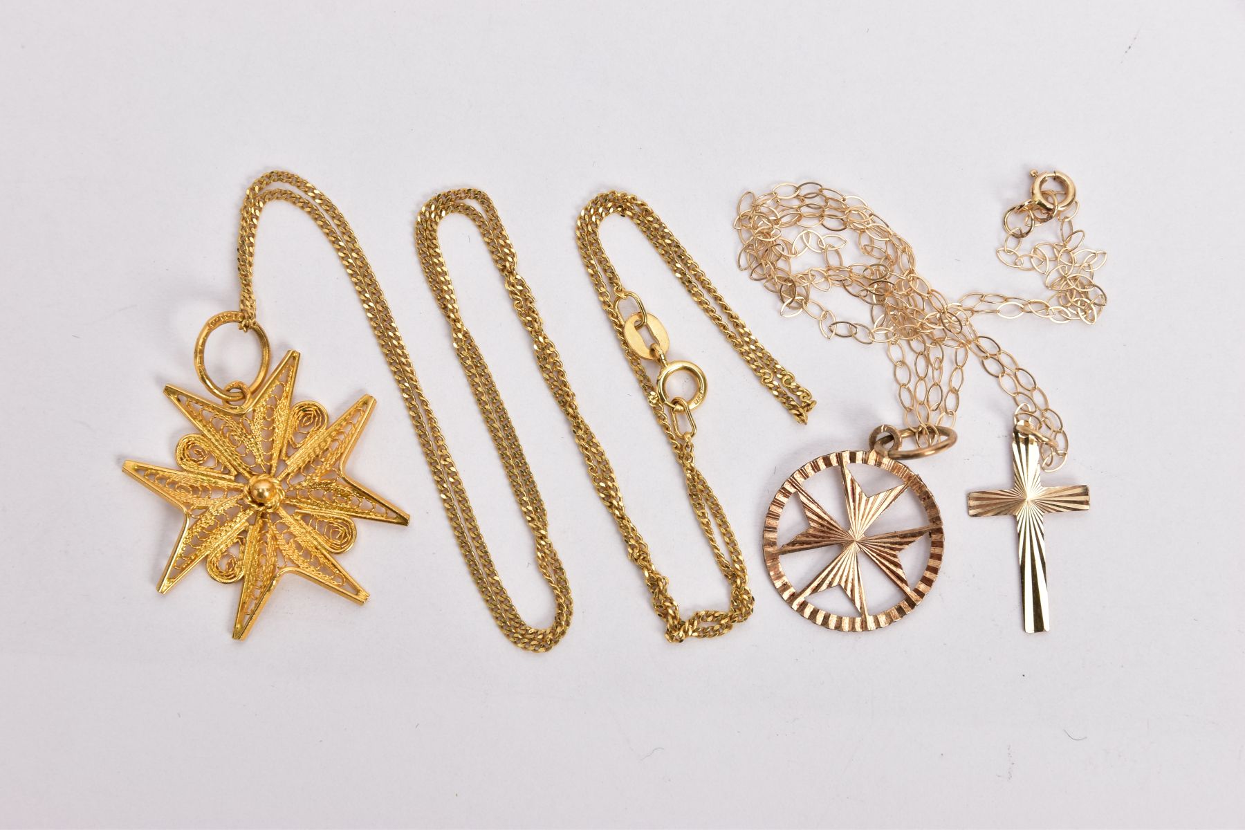 TWO PENDANT NECKLACES AND A YELLOW METAL PENDANT, to include a filigree Maltese pendant stamped '