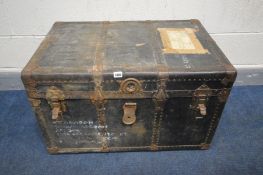 A BLACK DISTRESSED VINTAGE METAL BANDED TRAVELLING TRUNK, width 83cm x depth 55cm x height 50cm