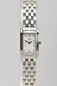 A LADIES STAINLESS STEEL 'LONGINES DOLCEVITA' QUARTZ WRISTWATCH, rectangular white dial signed '