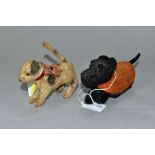 A SCHUCO CLOCKWORK TINPLATE AND FELT SCOTTIE DOG, black felt, orange patterned coat, glass eyes