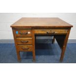 AN EARLY TO MID 20TH CENTURY OAK DESK, with four assorted drawers, and a brushing slide, width