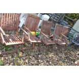 A SET OF FIVE HARDWOOD FOLDING GARDEN CHAIRS