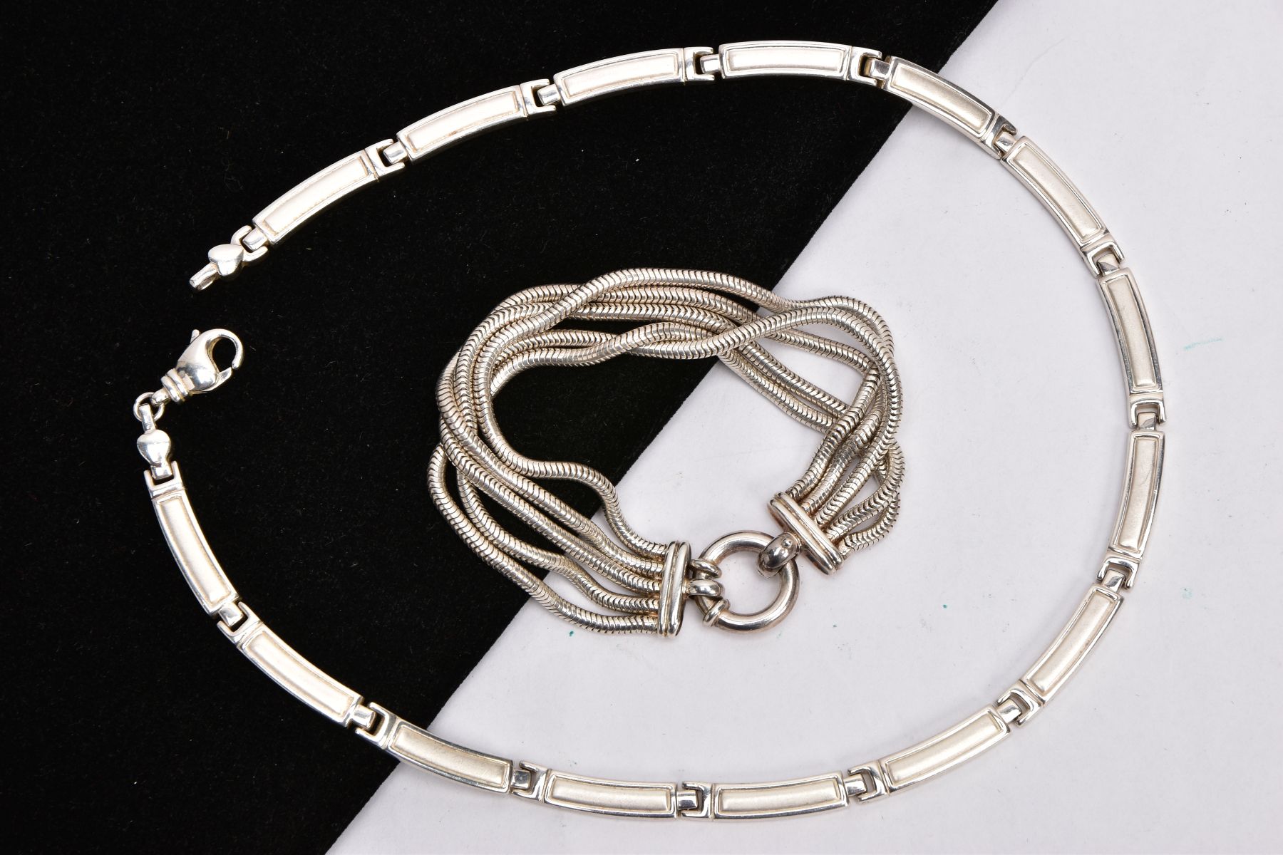 A SILVER ARTICULATED NECKLACE AND A BRACELET, the silver articulated necklace, curved links, - Image 2 of 3
