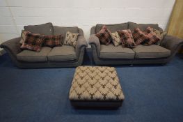 A PARTIAL GREY SUEDE AND UPHOLSTERED, THREE PIECE LOUNGE SUITE, comprising two sized sofas, width