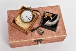 FOUR ITEMS, to include an Acier Garanti gunmetal open face pocket watch with black Roman numerals