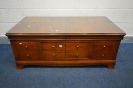 A WILLIS & GAMBIER STYLE CHERRYWOOD AND BOX INLAID COFFEE TABLE, the top with double sliding top