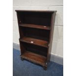 A 19TH CENTURY STAINED PINE WATERFALL OPEN BOOKCASE, on bracket feet, width 48cm x depth 21cm x