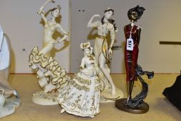 FOUR LEONARDO COLLECTION RESIN LADY FIGURES, two modelled as dancers in traditional costume, tallest