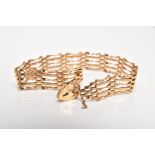 A 9CT GOLD GATE BRACELET, approximate width 6.6mm, fitted with a heart clasp, also fitted with a