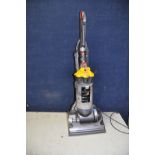 A DYSON DC33 UPRIGHT VACUUM CLEANER (PAT pass and working)