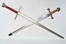 TWO REPLICA COPY SWORDS, a Medieval style sword, with approximately 83cm length blade, slightly