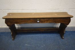 AN EARLY 20TH CENTURY BEECH BENCH, with a hinged top storage compartment, length 135cm