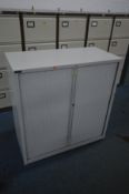 A TRIUMPH METAL DOUBLE ROLL FRONT OFFICE CABINET, with two shelves, width 101cm x depth 48cm x