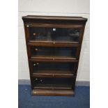 AN EARLY 20TH CENTURY OAK GLOBE WERNIKE STYLE FOUR SECTION BOOKCASE, with glazed fall front doors,