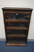 AN EARLY 20TH CENTURY OAK GLOBE WERNIKE STYLE FOUR SECTION BOOKCASE, with glazed fall front doors,