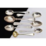 A SELECTION OF SILVER SPOONS, to include a silver gilt sauce spoon, a reeded fiddle pattern