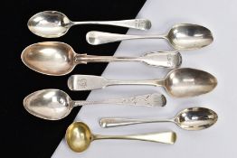 A SELECTION OF SILVER SPOONS, to include a silver gilt sauce spoon, a reeded fiddle pattern