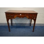 A GEORGIAN MAHOGANY AND INLAID SIDE TABLE, with two deep drawers flanking a single long drawer, on