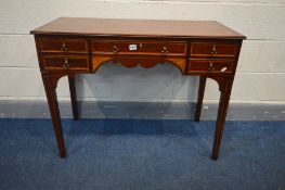 A GEORGIAN MAHOGANY AND INLAID SIDE TABLE, with two deep drawers flanking a single long drawer, on