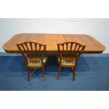 A YEWWOOD EXTENDING DINING TABLE, with a single fold out leaf, extended length 198cm x closed length