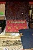 A GROUP OF ORIENTAL PRINTED EPHEMERA AND A CARVED PANEL, the carved hardwood panel with wavy edge,