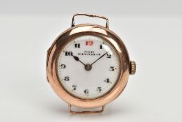 AN EARLY 20TH CENTURY 9CT GOLD WATCH HEAD, the circular head with white face and Arabic numerals,