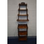 A VICTORIAN MAHOGANY BARLEY TWIST WHAT NOT, a raised gallery top, three tiers, on casters, height