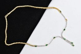 A MODERN 18CT GOLD DIAMOND AND EMERALD LINE NECKLACE, oval mixed cut emeralds each measuring