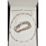 A SILVER ARTICULATED NECKLACE AND A BRACELET, the silver articulated necklace, curved links,