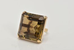 A 9CT GOLD, LARGE SMOKEY QUARTZ DRESS RING, designed with a four claw set, large square cut Smokey