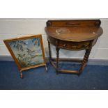 AN EARLY 20TH CENTURY OAK DEMI LUNE HALL TABLE, with a raised back, single frieze drawer, on