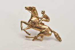 A 9CT GOLD HORSE AND JOCKEY BROOCH, 9ct hallmark for London 1986, length 50mm, approximate gross