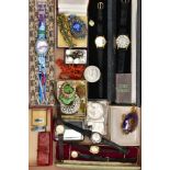 A BOX OF ASSORTED ITEMS, to include a case 'Swatch' wristwatch, two cased 'Accurist' wristwatches,