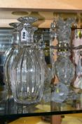 FIVE PIECES OF 19TH CENTURY GLASSWARE, comprising a pair of facet cut mallet shaped decanters with