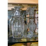 FIVE PIECES OF 19TH CENTURY GLASSWARE, comprising a pair of facet cut mallet shaped decanters with