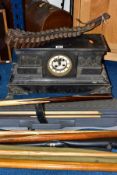 A CASED SINGER MANUAL SEWING MACHINE, GOLF CLUBS, LEATHER CARTRIDGE BELT, BLACK SLATE MANTEL