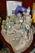 A BOXED LIMITED EDITION LILLIPUT LANE SCULPTURE, Out of the Storm L2064, No 0095/3000, with