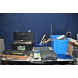 A PLASTIC TOOLBOX AND TWO TRAYS CONTAINING TOOLS along with a Bosch 240V drill, socket set, saws,