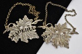 TWO EARLY 19TH CENTURY SILVER WINE LABELS, each in the form of leaves pierced with the word Madeira,