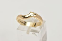 A 9CT GOLD MISSHAPEN BAND, plain polished band, misshapen in one place as if adjusted to fit under