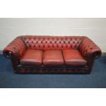 AN OXBLOOD LEATHER THREE SEATTER CHESTERFIELD SOFA, outer width 190cm (condition - cracks and