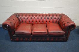 AN OXBLOOD LEATHER THREE SEATTER CHESTERFIELD SOFA, outer width 190cm (condition - cracks and