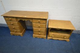 A PINE DESK, with two banks of four drawers, with a later added fold over flap to the back, width