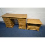 A PINE DESK, with two banks of four drawers, with a later added fold over flap to the back, width